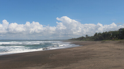 Pangandaran, Batu Hiu beach scenery is quiet and beautiful in summer with clear cloudy sky during the day.