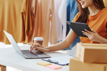 How To Start A Clothing Store Online Business apparel! Young confident asian female fashion owner...