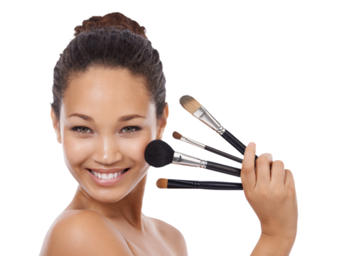 Portrait, woman and set of makeup brushes for face, cosmetics or aesthetic tools isolated on transparent png background. Happy female model, facial beauty and holding collection of skincare products - Powered by Adobe