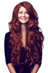Wavy, portrait and happy woman with red hair, curly texture and healthy locks, strong glow and...