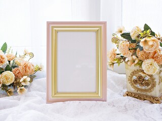 Photo frame , Empty frame for letter with yellow orange rose flowers background ,vintage style copy space ,romantic tone 