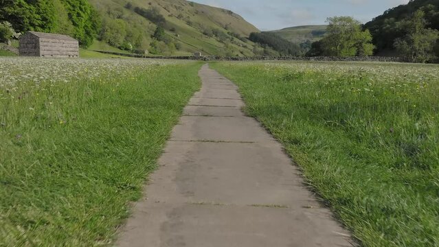 Drone footage of Muker and Valley that contain flower meadows