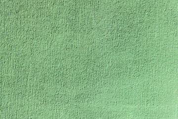 Naklejka na ściany i meble Green patterned concrete wall background surface. Abstract green grungy wall texture background