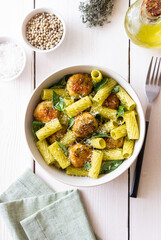 Pasta with chicken meatballs, basil and parmesan. Italian food.