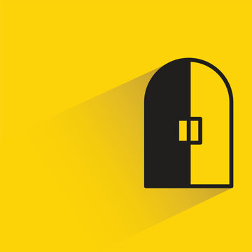 arch door with shadow on yellow background