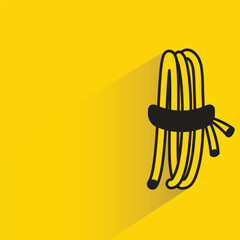 rope with shadow on yellow background