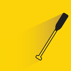 paddle with shadow on yellow background