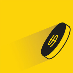 dollar coin with shadow on yellow background