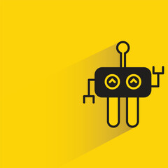 robot with shadow on yellow background