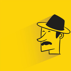 male face with shadow on yellow background