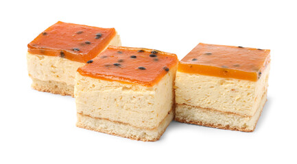 Pieces of cheesecake with jelly on white background