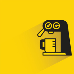 coffee machine with shadow on yellow background