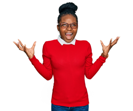 Young african american woman wearing casual clothes and glasses crazy and mad shouting and yelling with aggressive expression and arms raised. frustration concept.