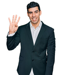 Handsome hispanic man wearing business clothes showing and pointing up with fingers number four while smiling confident and happy.