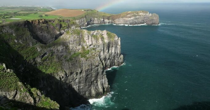 Cintr&atilde;o cliffs cliffs overhanging the ocean on the island of Sao Miguel in the Azores