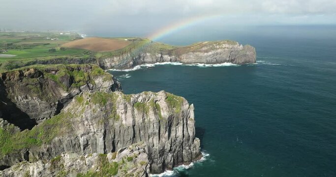 Cintr&atilde;o cliffs cliffs overhanging the ocean on the island of Sao Miguel in the Azores