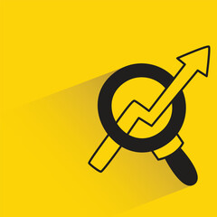 magnifier and graph with shadow on yellow background