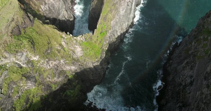 Cintr&atilde;o cliffs cliffs overhanging the ocean on the island of Sao Miguel in the Azores