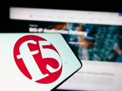 Stuttgart, Germany - 07-01-2023: Smartphone with logo of American application security company F5 Inc. on screen in front of website. Focus on center-left of phone display.