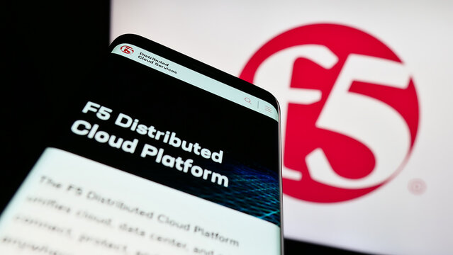 Stuttgart, Germany - 07-01-2023: Mobile phone with website of US application security company F5 Inc. on screen in front of business logo. Focus on top-left of phone display.