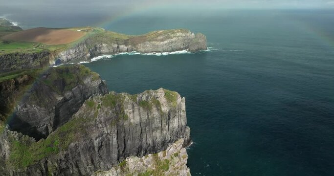 Cintr&atilde;o cliffs cliffs overhanging the ocean on the island of Sao Miguel in the Azores