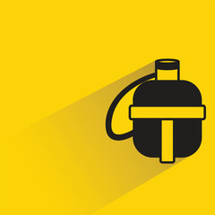 water canteen with shadow on yellow background