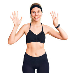 Fototapeta na wymiar Young beautiful blonde woman wearing sportswear showing and pointing up with fingers number nine while smiling confident and happy.