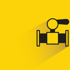 valve and pipeline with shadow on yellow background