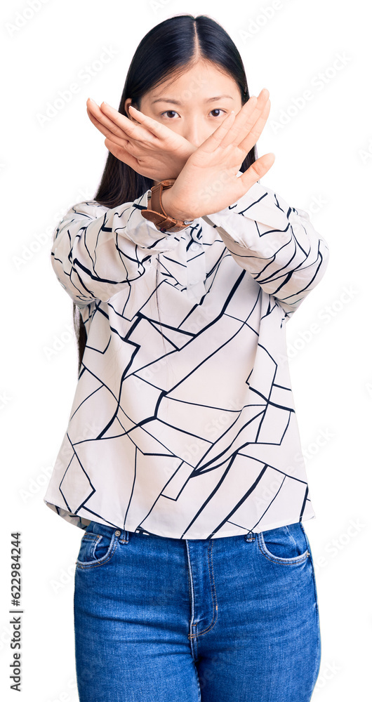 Sticker young beautiful chinese woman wearing casual shirt rejection expression crossing arms and palms doin