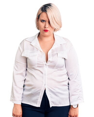 Young blonde plus size woman wearing casual shirt skeptic and nervous, frowning upset because of problem. negative person.