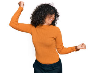 Young hispanic woman wearing casual clothes dancing happy and cheerful, smiling moving casual and confident listening to music