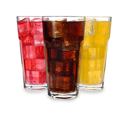Glasses of different refreshing soda water with ice cubes isolated on white