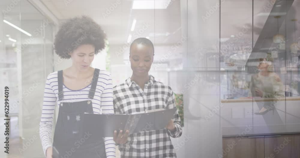 Canvas Prints Animation of diverse business people in office over cityscape