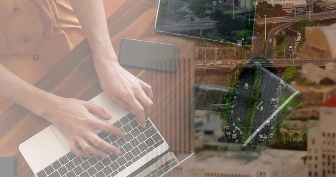 Animation of caucasian businesswoman using laptop over cityscape