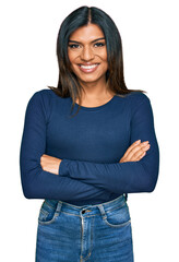 Young latin transsexual transgender woman wearing casual clothes happy face smiling with crossed arms looking at the camera. positive person. - obrazy, fototapety, plakaty