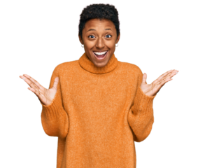 Young african american woman wearing casual clothes celebrating victory with happy smile and winner expression with raised hands