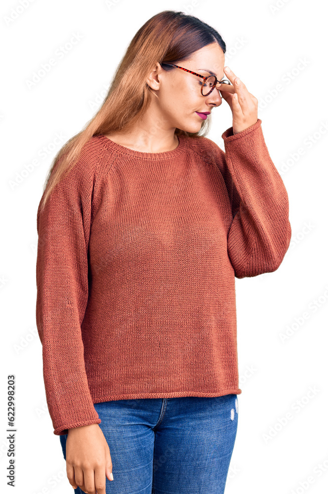 Poster beautiful young woman wearing casual clothes and glasses tired rubbing nose and eyes feeling fatigue