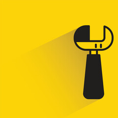 wrench with shadow on yellow background