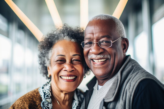 Happy Black Retired Couple Smiling At Home