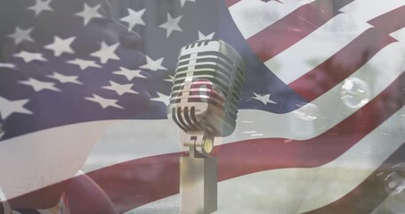 Animation of flag of usa over african american mother and son blowing bubbles and retro mic - Powered by Adobe