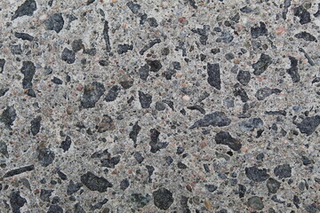 A photo of the pattern of stones in a  stone floor. 