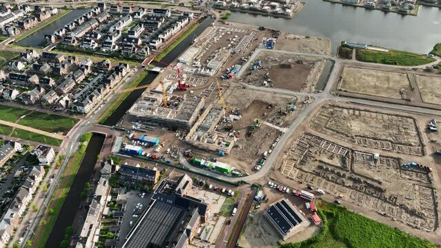 Drone view of new Dutch housing development project in Weesp around water canals