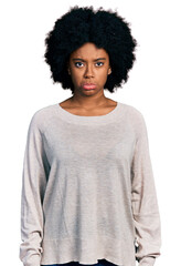 Young african american woman wearing casual clothes depressed and worry for distress, crying angry and afraid. sad expression.