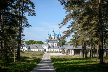 Fototapeta premium Russia, St. Petersburg, May 2023: Monastery on Konevets Island in Lake Ladoga