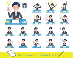 タブレット端末で学習するビジネス男性のセット