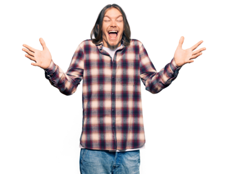 Handsome caucasian man with long hair wearing hipster shirt celebrating mad and crazy for success with arms raised and closed eyes screaming excited. winner concept