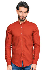 Young hispanic man wearing casual clothes depressed and worry for distress, crying angry and afraid. sad expression.