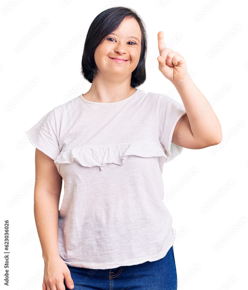 Sticker brunette woman with down syndrome wearing casual white tshirt showing and pointing up with finger nu