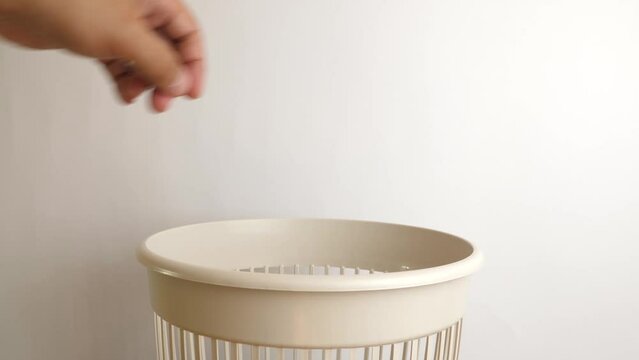 A broken hairbrush is recycled and thrown into the trash. The concept of disposal and recycling of waste.