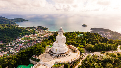 Phuket Big Buddha statue. afternoon light sky and blue ocean are on the back of white Phuket big...